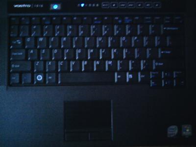 Keyboard with speakers on side and touchpad